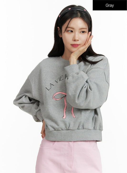 RIBBON GRAPHIC SWEATSHIRT