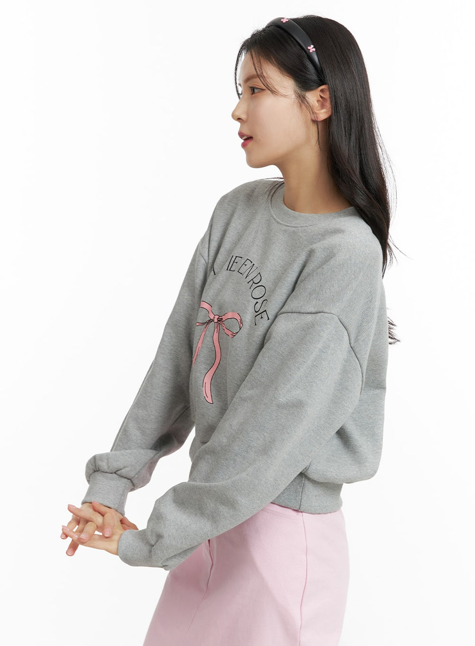 RIBBON GRAPHIC SWEATSHIRT